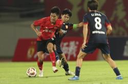 爱游戏官网-广州队在中超中打出破门，被誉为观众齐声高喊